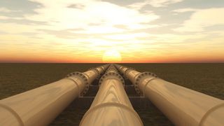 Die Gas-Versorgungslage bereitet vielen Kund*innen Sorgen Symbolbild: Gasleitungen vor Sonnenuntergang